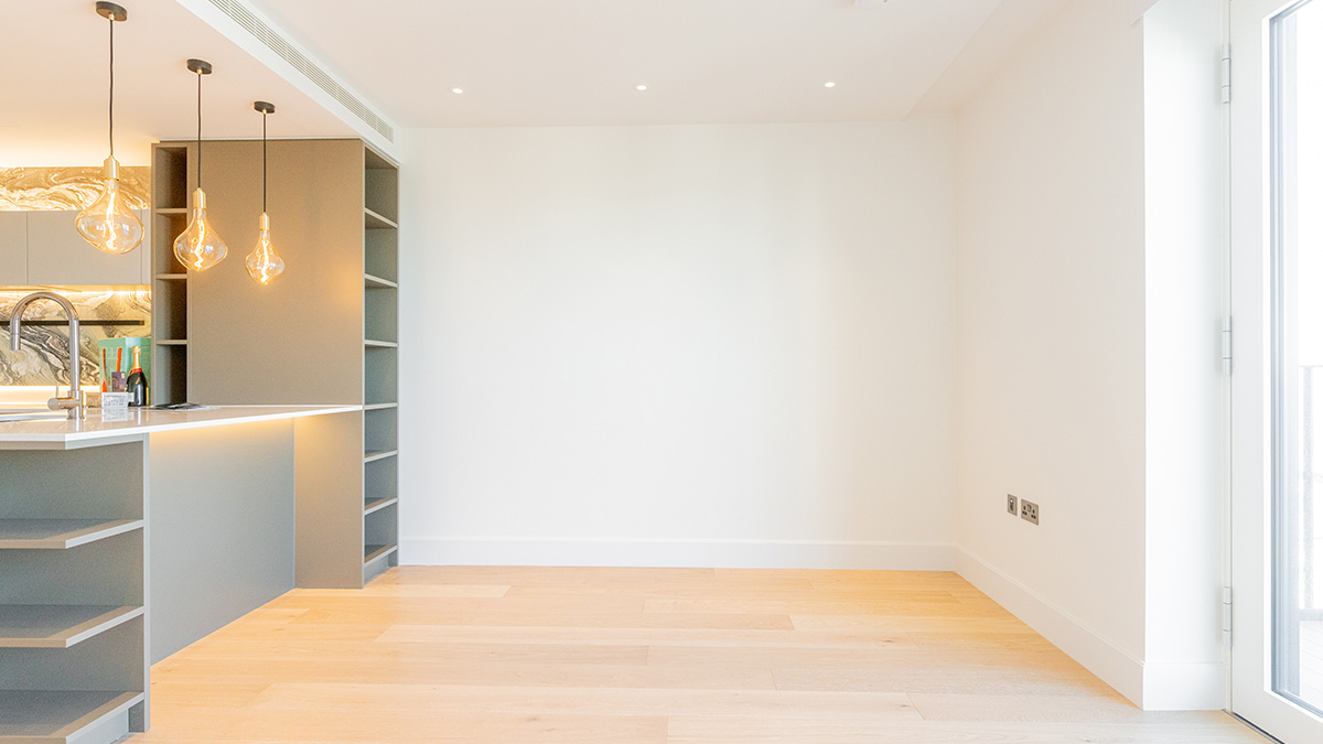 Open plan apartment space in Dubai before handover showing unfurnished interior