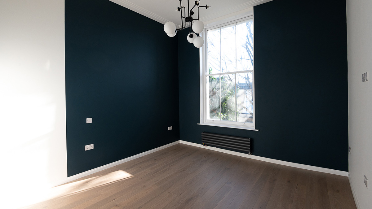Unfurnished bedroom awaiting furniture installation before becoming a rental-ready apartment in Dubai.