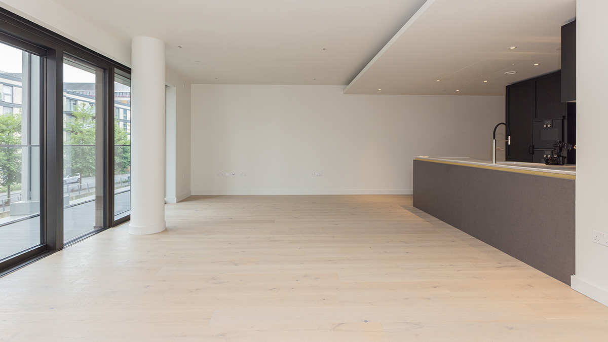 Open-plan apartment before furnishing and home staging as part of a Dubai property handover preparation.