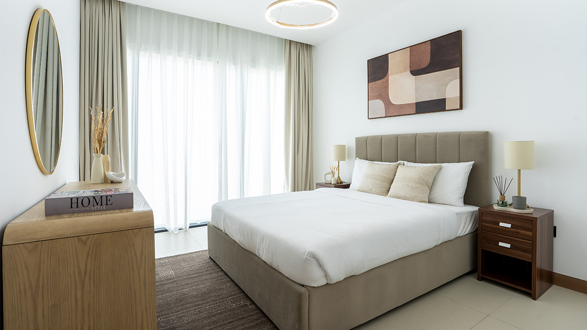 Elegant master bedroom furnishing at Vida Residences Dubai Marina apartment